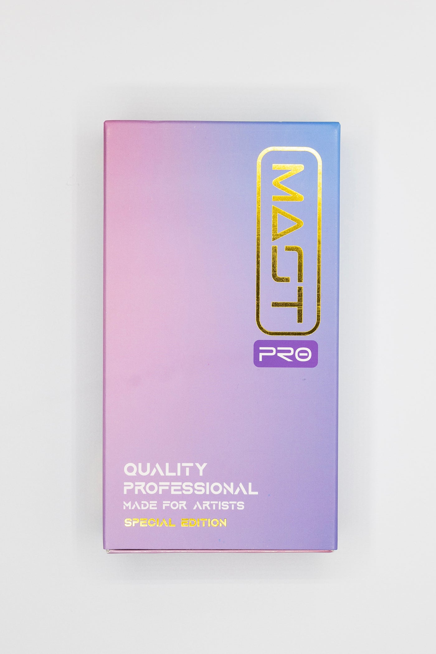 A box with a gradient of pink and blue shades reads "MAST PRO SE UNIVERSAL NEEDLE CARTRIDGE (3RL)," "QUALITY PROFESSIONAL," "MADE FOR ARTISTS," and "SPECIAL EDITION." Inspired by Dragonhawk, the design promises premium quality.